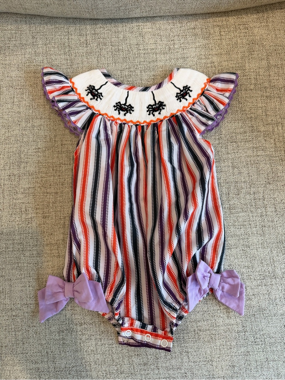Smocked Halloween Spider Baby Romper with Lavender Bows